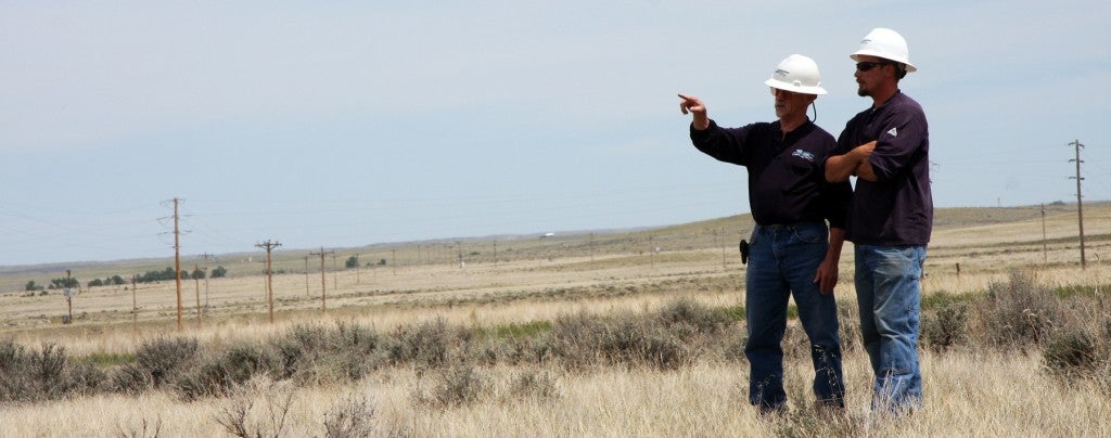 Linemen in a field